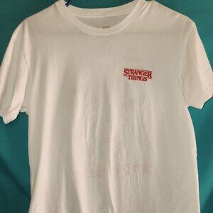 White Stranger Things "It Only Gets Stranger" Women's T-Shirt, Size M